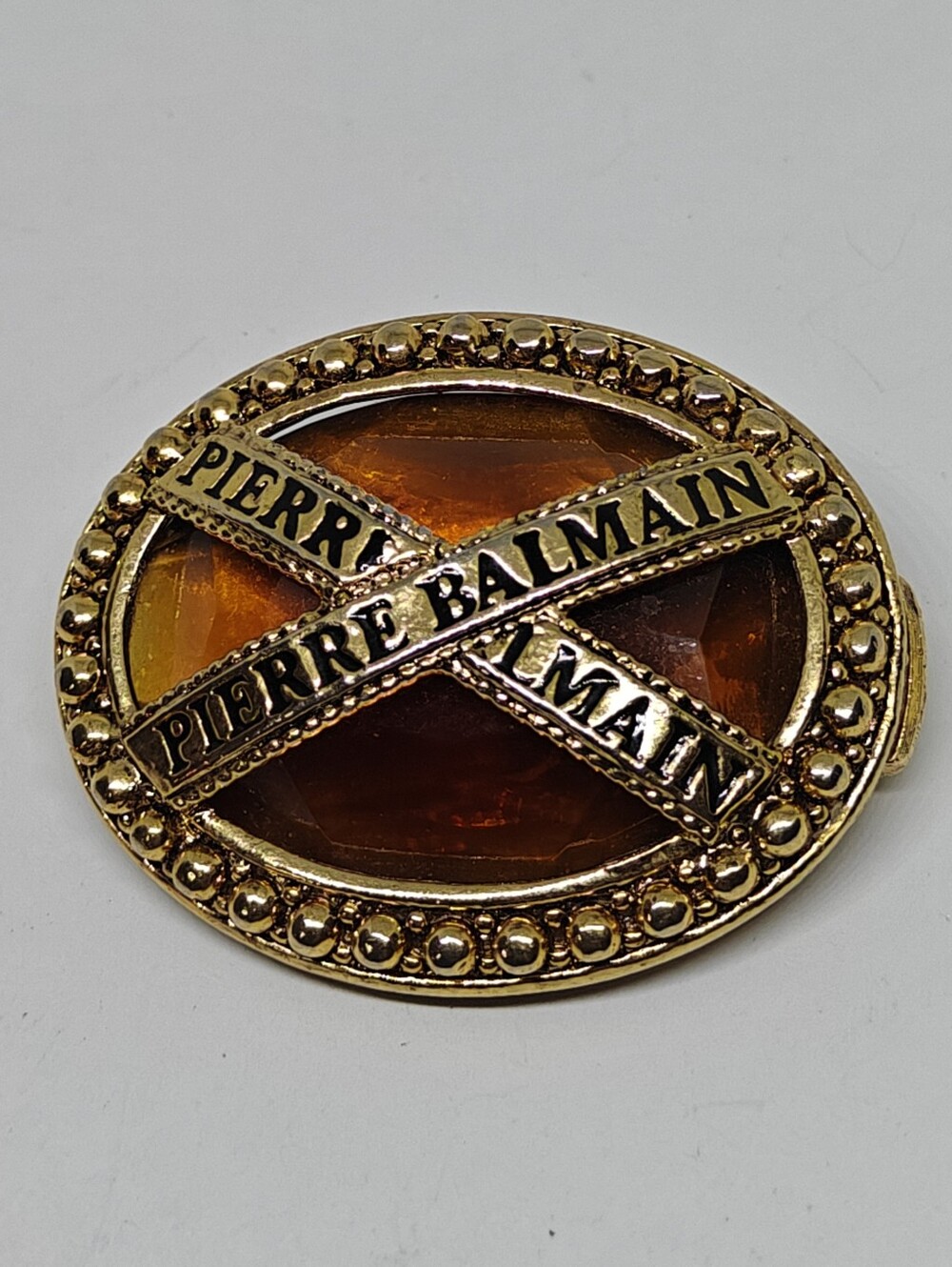 Vintage Pierre Balmain Amber Glass Cabochon Logo Brooch